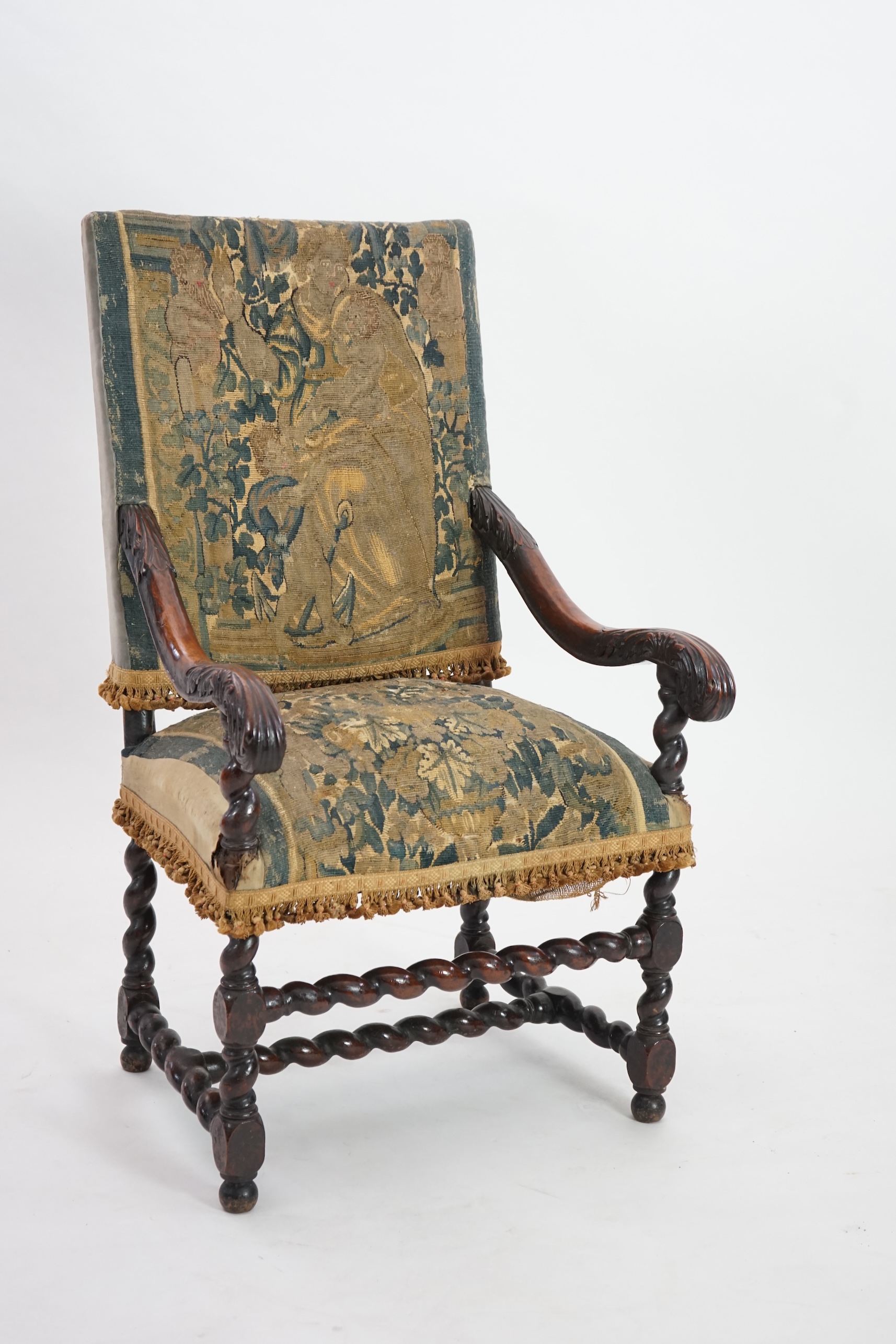 A 17th century French walnut fauteuil